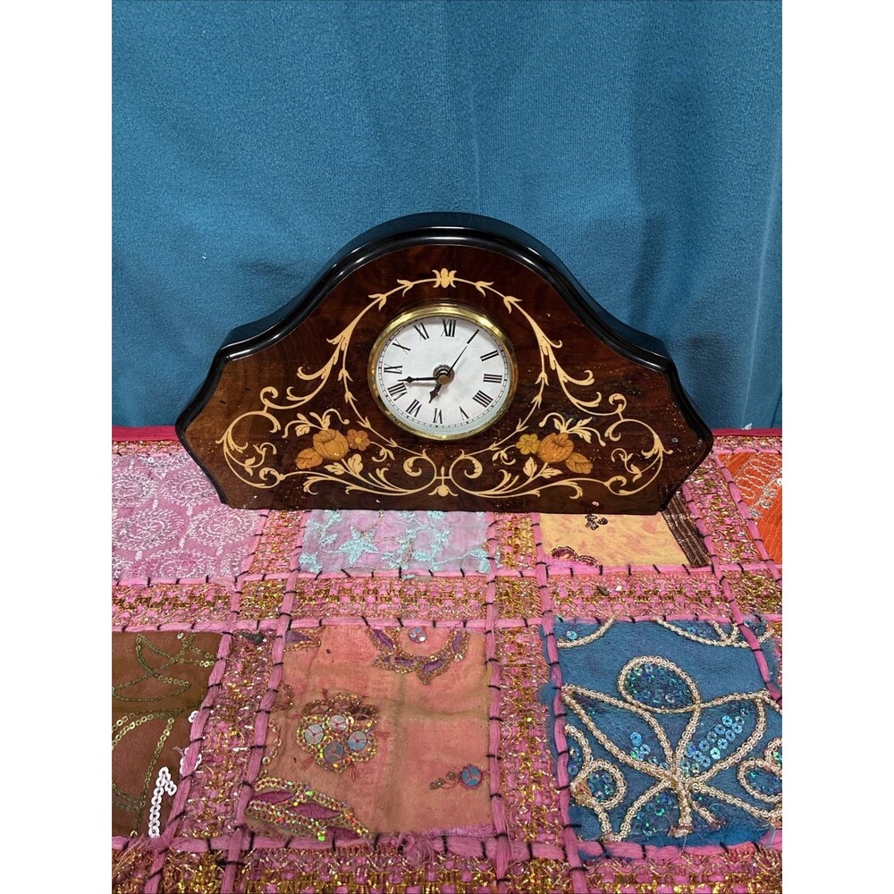 Vintage rare Italian mantel Swiss clock in lacquer wood.